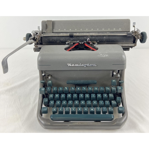 1258 - A vintage 1950's Remington typewriter.