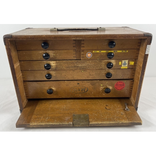 1295 - A vintage wooden M & W (Moore & Wright) engineers 7 drawer tool chest. Bakelite handles to all drawe... 