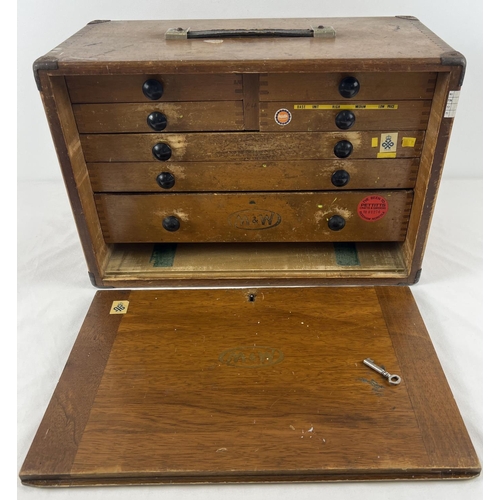 1295 - A vintage wooden M & W (Moore & Wright) engineers 7 drawer tool chest. Bakelite handles to all drawe... 