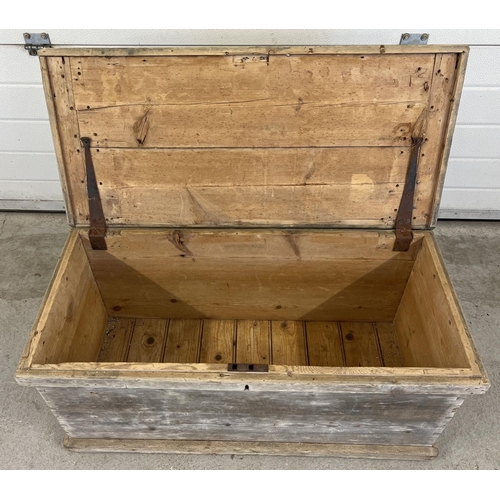 1323 - An antique 2 handled pine box with drop down handles and dove tail joints. Some damage to lid. Appro... 