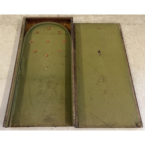 1327 - An Edwardian large wooden bagatelle table with green baize interior. In need of restoration. Total l... 