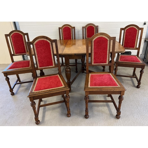 1328 - A vintage medium oak drop leaf table with shaped legs together with 6 dining chairs with red and gol... 