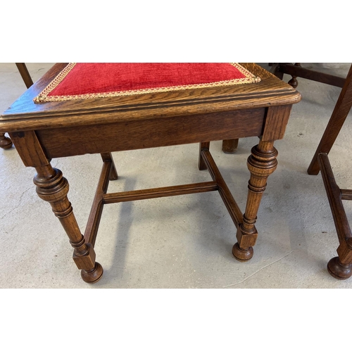 1328 - A vintage medium oak drop leaf table with shaped legs together with 6 dining chairs with red and gol... 