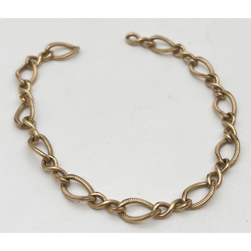 1051 - A scrap gold bracelet - fixing links and clasp missing. Tests as 9ct gold. Total weight approx. 5.7g... 