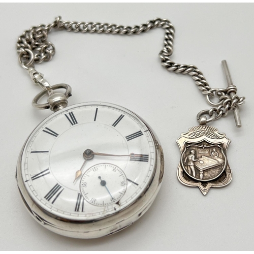 1104A - A Victorian fusee silver pocket watch, hallmarked London 1886. Complete with white metal Albert and ... 