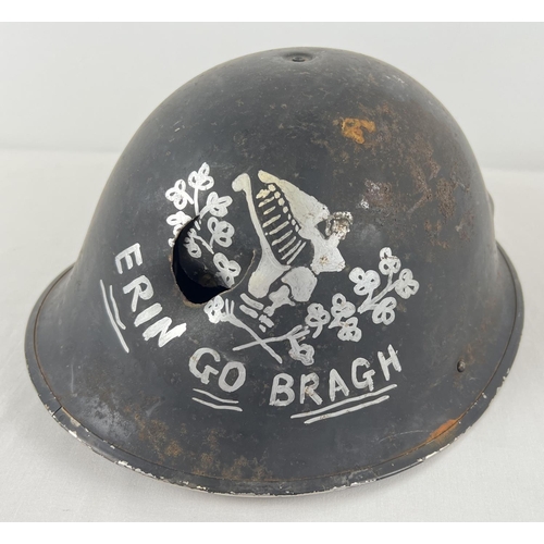 1143 - A British MkIV steel helmet shell with painted Eirin Go Bragh (Ireland Forever) slogan. Believed to ... 