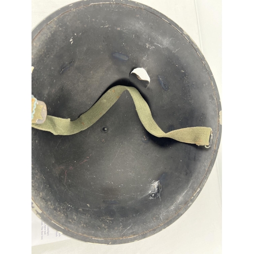 1143 - A British MkIV steel helmet shell with painted Eirin Go Bragh (Ireland Forever) slogan. Believed to ... 