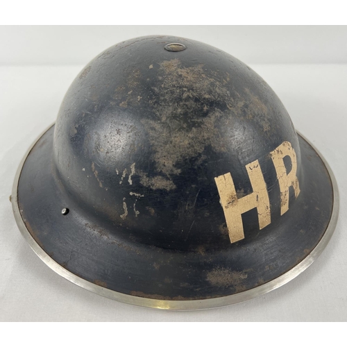 1146 - A British Home Front MkII WWII steel helmet painted black and labelled in white HR for Heavy Rescue.... 