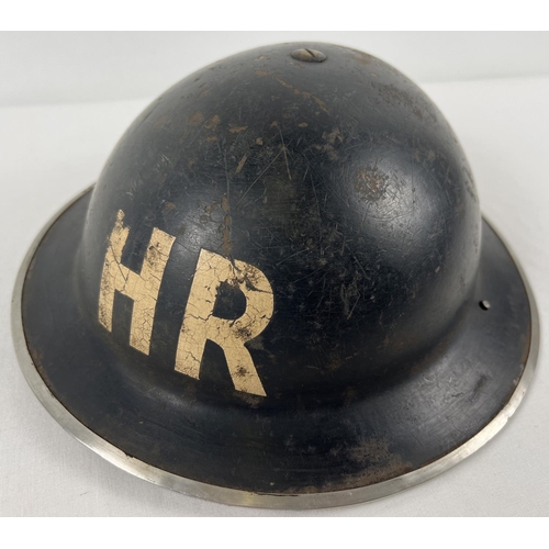 1146 - A British Home Front MkII WWII steel helmet painted black and labelled in white HR for Heavy Rescue.... 