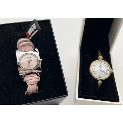 1107 - 2 women's boxed wrist watches. A vintage French fixed bangle watch with twist face fixing - in worki... 