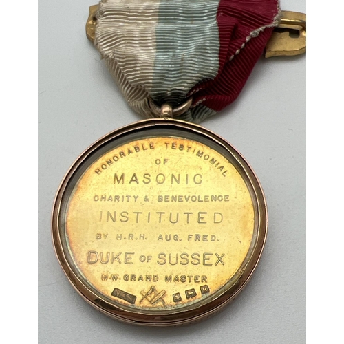 1251 - A boxed silver gilt Duke of Sussex charity Masonic watchcase jewel with 9ct gold engraved band. In F... 