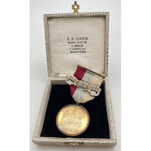 1251 - A boxed silver gilt Duke of Sussex charity Masonic watchcase jewel with 9ct gold engraved band. In F... 