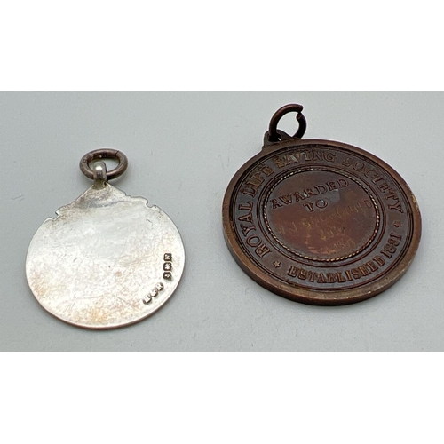 1127 - A silver medal fob with laurel leaf and scroll decoration to front with empty cartouche. Hallmarked ... 