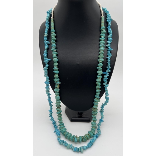 1031 - 2 large turquoise beaded necklaces. A 34