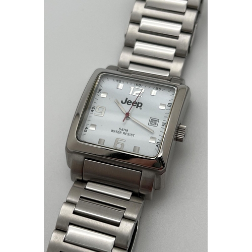 1111 - A men's wristwatch with stainless steel strap by Jeep. square silver tone case with white face and s... 