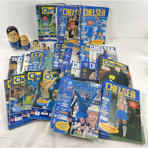 1229 - A collection of 62 assorted Chelsea FC football programmes dating from 1997 to 2006. Together with a... 