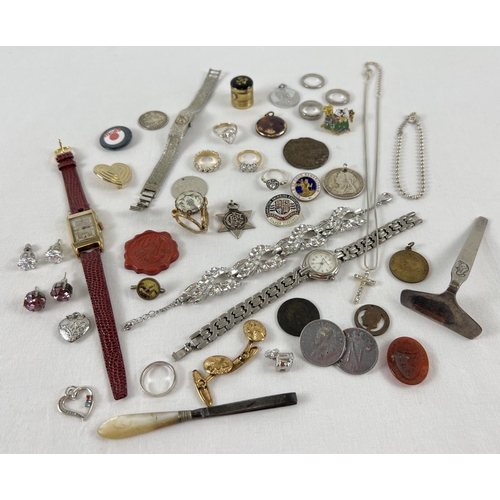 1050 - A small box containing a collection of costume jewellery rings, earrings and pendants, ladies wristw... 