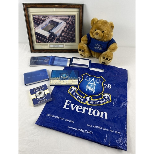 1234 - A collection of various Everton FC items to include a picture of Goodison park, little book of Evert... 