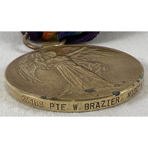 1148 - A WWI Victory medal with ribbon named to rim 