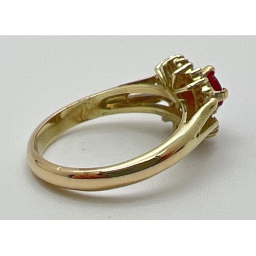 1008 - A 18ct gold dress ring set with a central round cut .25 carat ruby and 26 baguette cut diamonds. Tot... 