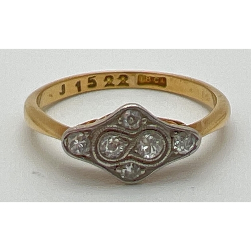 1001 - An 18ct gold Art Deco diamond dress ring. Diamond shaped mount with pierced work to sides, set with ... 