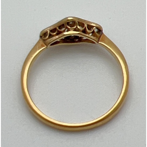 1001 - An 18ct gold Art Deco diamond dress ring. Diamond shaped mount with pierced work to sides, set with ... 