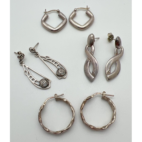 1082 - 4 pairs of modern design silver earrings in both hoop and drop styles, to include Rennie Macintosh d... 