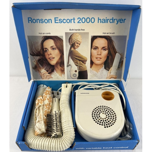 1257 - A boxed vintage Ronson Escort 2000 hairdryer. Complete with hot air comb & brush, cap and shoulder s... 