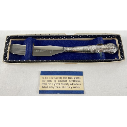 1129 - A 1960's boxed silver handled butter knife, fully hallmarked to handle. For Sheffield 1966 with HB m... 