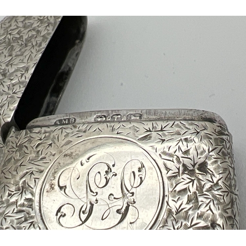 1130 - An antique silver Vesta case with floral decoration throughout and engraved initials to front cartou... 