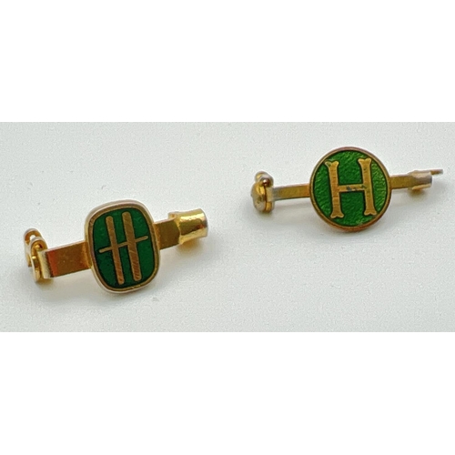 1264 - 2 vintage gold tone and green enamel Harrod's senior staff lapel badges. Both approx. 2cm long.