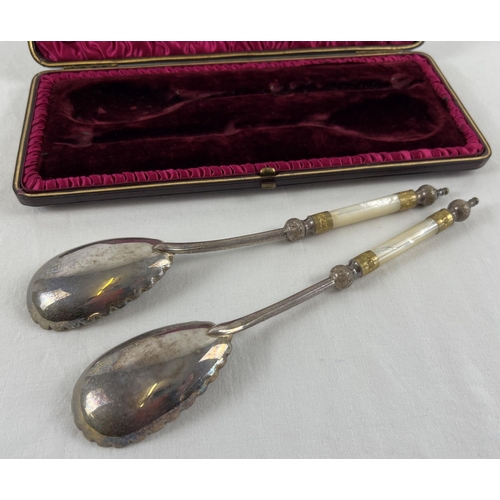 1131 - A pair of late Victorian silver plated serving spoons with gilt bowls and mother of pearl handles. D... 