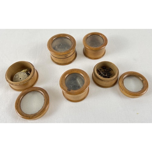 1121 - 4 vintage glass topped treen watchmakers pots containing various watch parts. Largest approx. 4cm di... 