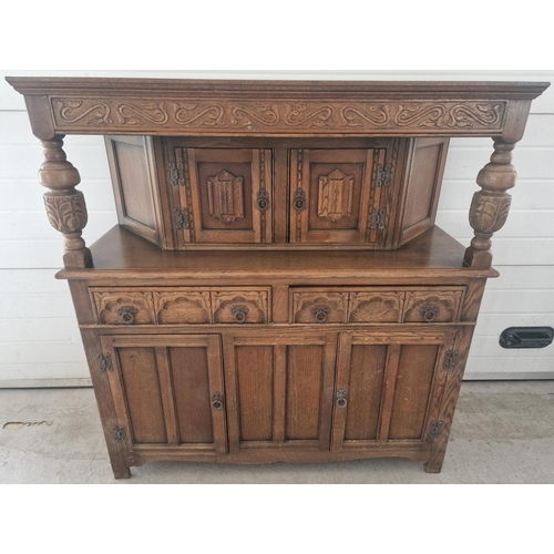 1291 - A vintage medium oak Old Charm court cupboard with Gothic style metal drop down handles & hinges. Tr... 