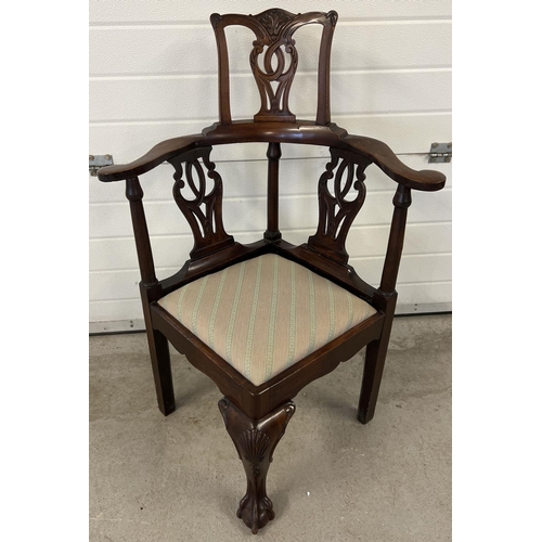 1304 - An Edwardian Chippendale style high back corner chair with carved detail. Decoratively shaped suppor... 