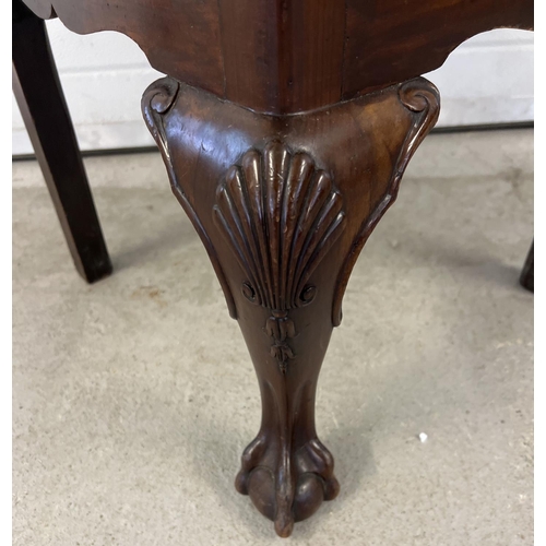 1304 - An Edwardian Chippendale style high back corner chair with carved detail. Decoratively shaped suppor... 