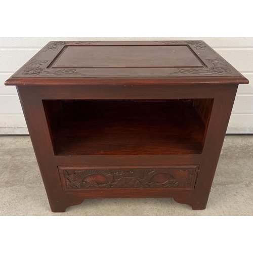 1311 - A vintage Chinese style unit with painted red mahogany effect and carved detail. Open shelf to front... 