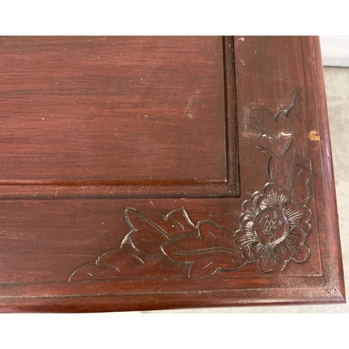 1311 - A vintage Chinese style unit with painted red mahogany effect and carved detail. Open shelf to front... 