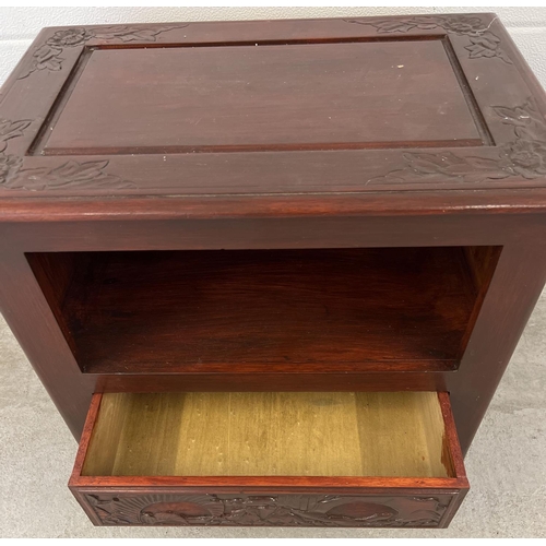 1311 - A vintage Chinese style unit with painted red mahogany effect and carved detail. Open shelf to front... 