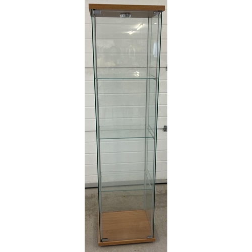 1313 - A modern square shaped glass cabinet with front opening full sized door and 3 interior glass shelves... 