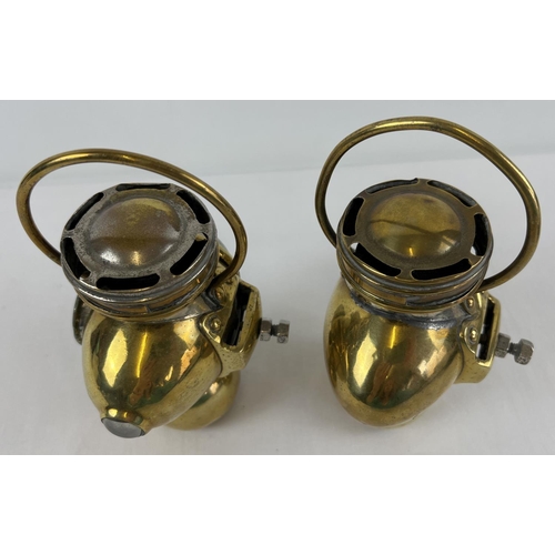 1208 - A pair of 1920's Sherwood Linley Ltd brass oil powered automobile lamps. Named to wick winders and c... 