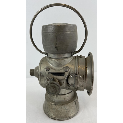 1210 - A early 20th century Joseph Lucas Ltd King of the Road No. 630 motor car lamp. With hinged front ope... 