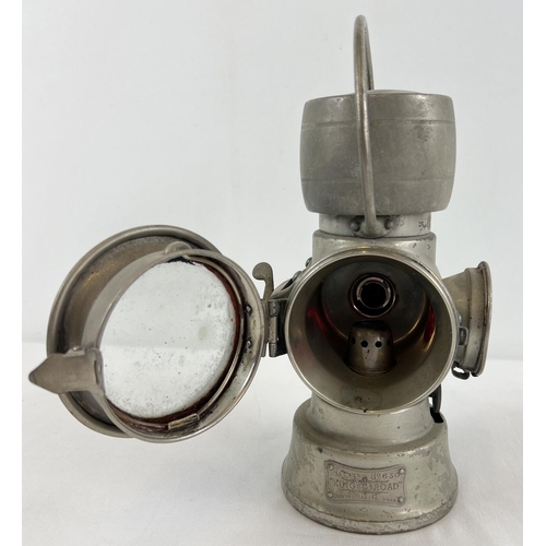 1210 - A early 20th century Joseph Lucas Ltd King of the Road No. 630 motor car lamp. With hinged front ope... 