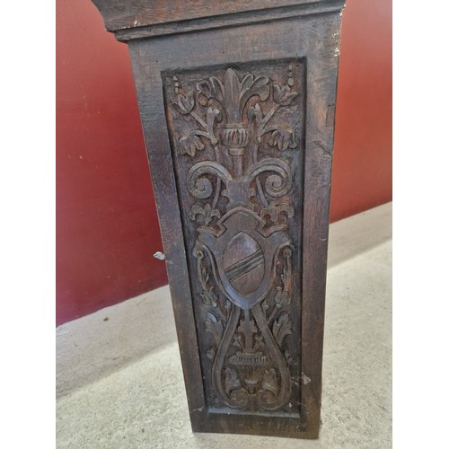 1317 - An antique dark oak, glass fronted wall cabinet with decorative carved panel sides. 2 adjustable int... 