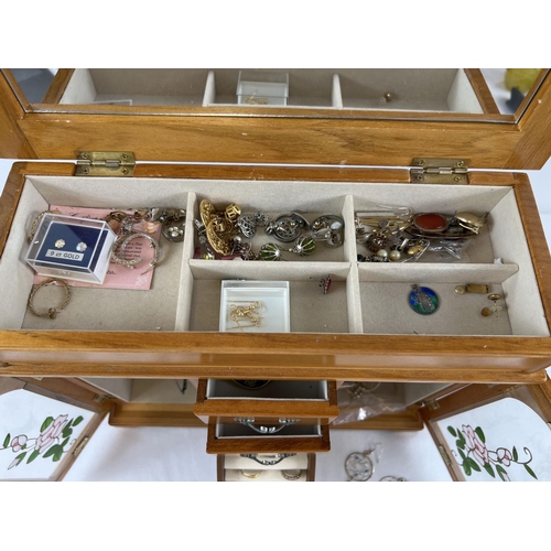 1097 - A wooden jewellery cabinet with a quantity of assorted vintage costume jewellery. To include earring... 