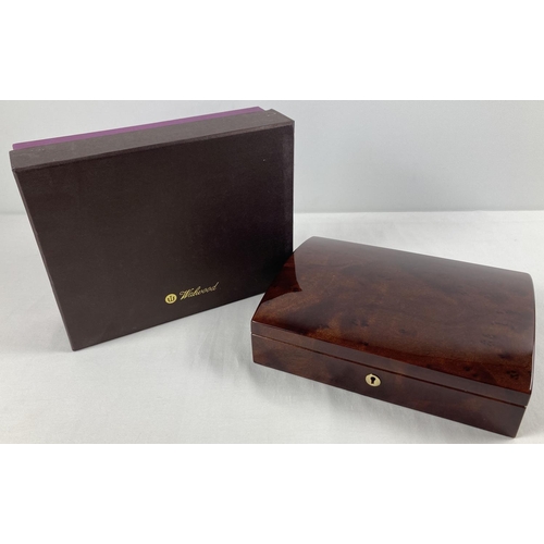 1103A - A new and boxed red Birdseye maple jewellery box by Walwood. Cream velveteen lining with ring/earrin... 