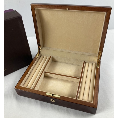 1103A - A new and boxed red Birdseye maple jewellery box by Walwood. Cream velveteen lining with ring/earrin... 