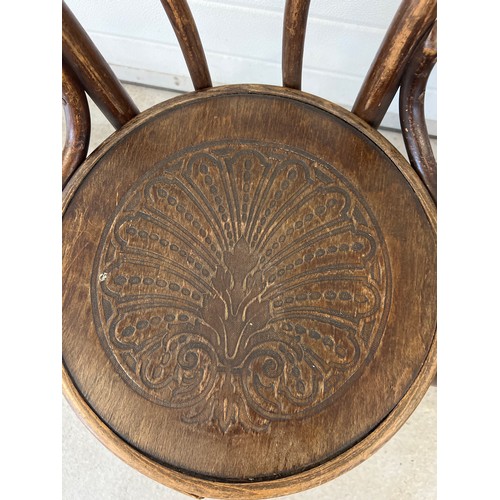 1285 - A pair of vintage European dark wood bentwood bistro chairs by Mundus and J&J Kohn. With embossed fo... 