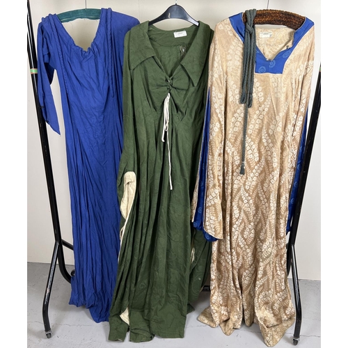 63 - 3 theatre costume medieval style tunic dresses, in varying colours.