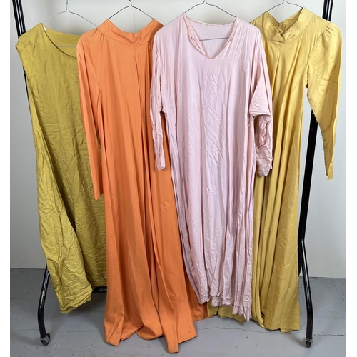 65 - 4 medieval style theatre costume long length tunic dresses. In orange and yellow tones.